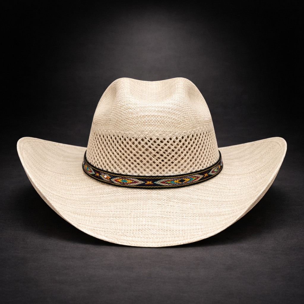 Beige cowboy hat with a decorative band on a black background